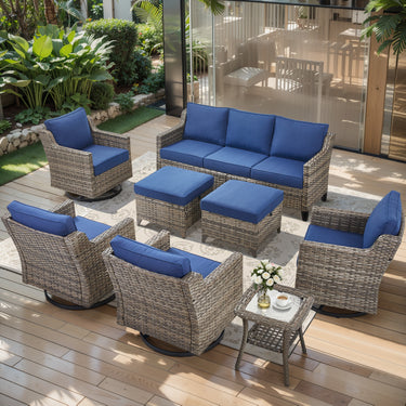 Belord 8-piece patio conversation set with sofa, four swivel chairs, two ottomans, and side tables for outdoor lounging.