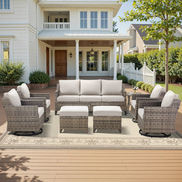 Belord 8-piece patio conversation set with sofa, four swivel chairs, two ottomans, and side tables for outdoor lounging.