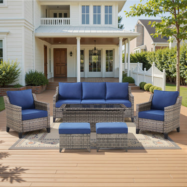Belord 6-piece outdoor lounge set with hand-woven wicker sofa, patio chairs, coffee table, ottomans, and plush cushions.