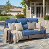 Belord oversized 3-seater wicker sofa with high back and 6-inch cushions, perfect for outdoor or patio lounging.