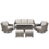 Belord 7-piece patio conversation set with sofa, two swivel chairs, coffee table, and two ottomans in outdoor setting.