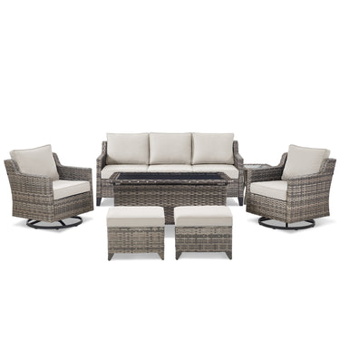 Belord 7-piece patio conversation set with sofa, two swivel chairs, coffee table, and two ottomans in outdoor setting.