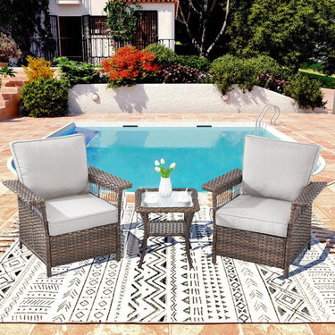 Set of three Belord outdoor wicker patio chairs with matching side table, featuring stylish woven design and comfortable cushions.