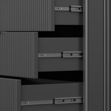 Black Belord 47-inch wood dresser with 8 drawers featuring fluted boho design, ideal for bedroom storage and decor.