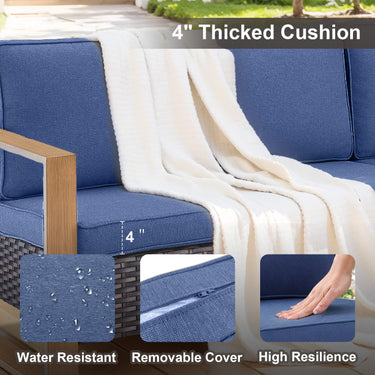 Belord deep-seat wicker patio sofa with blue cushions and wood grain frame, spacious 3-person outdoor conversation set.