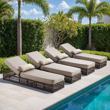 Brown wicker 4-piece outdoor lounge set with beige cushions, including four adjustable chaise lounges for patio relaxation.