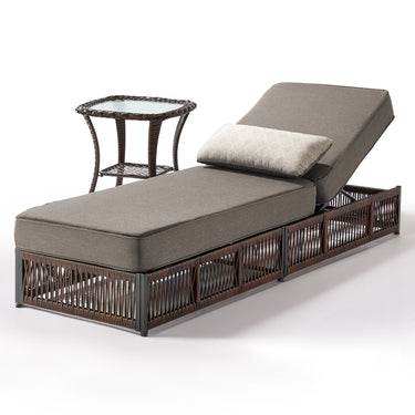 Brown wicker chaise lounge with grey cushions and side table from Belord Solo Relaxation Set, patio furniture cushions.