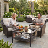 Belord outdoor wicker coffee table with glass top and two-tier storage, perfect for patio conversation sets.