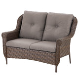 Belord wicker outdoor loveseat with high back and floral armrest design, perfect for patio lounging.