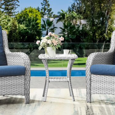 Belord Square outdoor wicker side table with glass top and storage shelf, ideal for patio conversation sets.