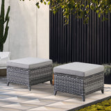 Two Belord patio wicker ottomans with side tables in the NTC Series, perfect for outdoor conversation and relaxation.