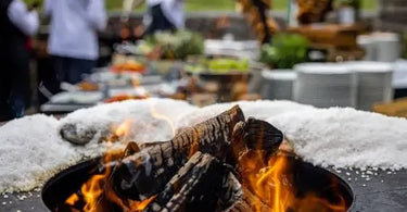 How to Host the Perfect Outdoor Dinner Party Around a Fire Pit Table?