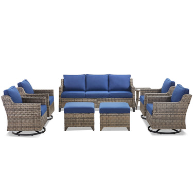 Belord 8-piece patio conversation set with sofa, four swivel chairs, two ottomans, and side tables in an outdoor setting.