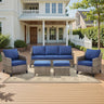 Belord 5-piece outdoor lounge set with high-back wicker couch, two patio chairs, ottomans, and plush cushions for patio relaxation.