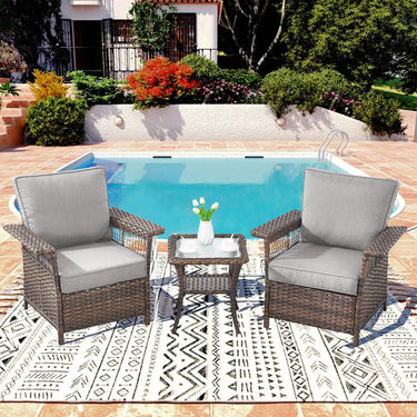 Set of three outdoor wicker patio chairs with a matching side table by Belord, ideal for garden or patio seating.