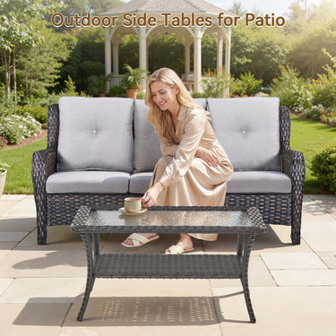 Belord outdoor wicker coffee table with glass top and storage shelf, part of the NTC series patio conversation sets.