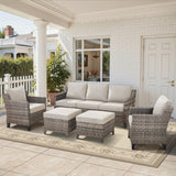 Belord 5-piece outdoor lounge set with high-back wicker couch, two patio chairs, and ottomans with plush cushions.