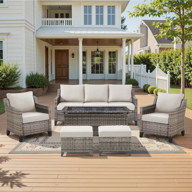 Belord 6-piece outdoor lounge set with hand-woven wicker sofa, patio chairs, coffee table, ottomans, and plush cushions.