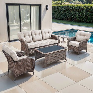Belord luxury 5-piece patio conversation set with brown wicker, beige cushions, sofa, two chairs, side table, and coffee table.