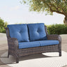 Belord outdoor wicker loveseat sofa with blue cushions, 53-inch 2-seater patio conversation set in brown wicker.