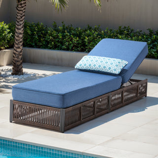 Belord brown wicker patio chaise lounge with blue cushion, 6-position recline, 5-inch thick cushion for outdoor relaxation.