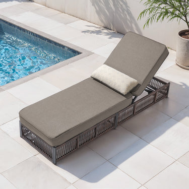 Belord 1-piece luxury rattan chaise lounge with grey cushion, brown wicker, 6-position recline, and 5-inch cushion for patio comfort.