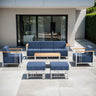 Belord BINGLI 6-piece patio conversation set with sofa, swivel chairs, and ottomans, all in white, for outdoor relaxation.