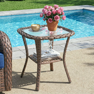 Square Belord outdoor wicker side table with glass top and storage shelf, ideal for patio conversation sets.