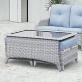 Belord outdoor wicker coffee table with glass top and ottoman storage, part of the NTC series patio conversation set.