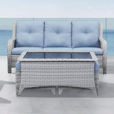 Belord outdoor wicker coffee table with glass top and ottoman storage, part of the patio conversation set in the NTC series.